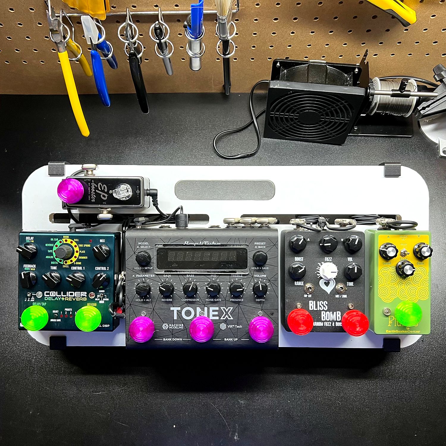 White pedalboard with Collider, ToneX, Bliss Bomb, Plumes and EP Booster pedals
